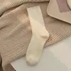 Meias de lã femininas, espessadas e forradas com fleece para aquecimento, cor sólida, simples e versáteis, meias de cano longo estilo japonês para outono e inverno