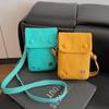 Bolso para Teléfono Móvil para Mujer Verano 2025 Nuevo Bolso Mini Cruzado Lona Color Sólido Simple Combinable Vertical Monedero