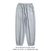 Pantalones de hombre al por mayor, modernos y versátiles, pantalones deportivos tipo jogger para primavera y verano, pantalones largos casuales de gofre holgados para hombre