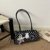 Bolso de alta gama para mujer de gran capacidad, nuevo diseño de nicho de verano 2026, bolso de hombro o axila de lunares, comercio exterior transfronterizo