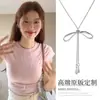 Colar de laço retrátil doce e simples para mulheres, design de nicho estilo coreano, acessório longo, conjunto de pingentes versátil