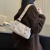 Bolso pequeño cuadrado de moda y versátil, nuevo modelo 2026, bolso de hombro de gran capacidad para el trabajo, bolso de mujer elegante y de alta gama, bolso de moda para llevar debajo del brazo