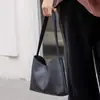 Bolsa feminina simples, novo modelo 2026, grande capacidade, adequada para o trabalho e uso casual, estilo vintage, bolsa de ombro para o dia a dia com um design de qualidade