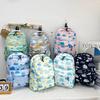 Mochila de Dinosaurio Primavera 2025 Nueva Llegada Estilo Coreano Gran Capacidad Bolso Cruzado de Mano para Niña Transfronterizo de Moda