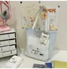 Bolsa de Tutoría Estilo Japonés 2025 Nueva Dulce Linda Niña Dibujos Animados Bolsa de Tutoría Simple Gran Capacidad para Viajar Cruzada
