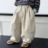 Calça Casual Solta de Primavera para Meninos 2026 Nova Estilo Coreano Primavera e Outono Calça Reta Curva para Crianças Calças Longas de Meninos