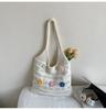 Bolsa Casual Vazada Bolsa de Praia Tecida 2025 Primavera e Verão Nova Tendência Preguiçosa Grande Capacidade Bolsa Tote de Ombro Tricotada