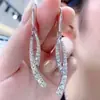 Aguja de plata 925 puesto mercado nocturno suministro aretes moda mujer asimétricos populares explosiones japonesas y coreanas aretes al por mayor A