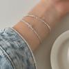 Pulsera pequeña de plata rota con un tesoro azul marino claro natural, con costuras, diseño de nicho bañado en plata 925, pulsera femenina de alta calidad