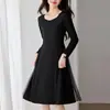 Elegante vestido negro holgado adelgazante de malla brillante talla grande para mujer, de manga larga, para primavera y otoño