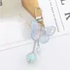 Cuentas como Joyería Nuevo Llavero de Mariposa Láser Corazón de Niña Colgante para Mochila Escolar Colgante para Cubierta Protectora de AirPods para Mujeres