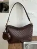 Bolso tejido de nicho súper popular para mujer, nuevo modelo 2026, versátil para el trabajo, bolso de hombro y cruzado, bolso tipo cubo de moda de alta gama