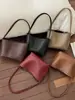 Bolsa transfronteiriça de alta qualidade com padrão trançado para mulheres, novo design de nicho da moda 2026, bolsa de ombro e de ombro versátil e elegante