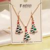 Europeo y Americano Vacaciones Nueva Serie Navideña Árbol de Navidad Papá Noel Adornos Gota de Aceite Pendientes Collar Conjunto de Tres Piezas para Mujer