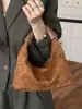 Elegante y texturizada bolsa vintage para mujer, nuevo modelo 2026, bolso de hombro y cruzado, bolso tote de axila de gran capacidad de moda para el día a día