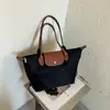 Bolso Tote Mujer 2026 Nueva Tendencia de Moda Bolso de Mano Gran Capacidad Versátil para Viajes Diarios Bolso de Hombro Bolso de Axila