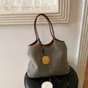 Bolsa Versátil Casual de Verano para Vacaciones Transfronteriza 2026 Tejida para Viajes Diarios Moda Simple Bolso de Hombro o Axila Tote