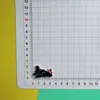 Lazo de Dibujos Animados Perro Blanco y Negro Accesorios Pequeños Zuecos DIY Funda de Teléfono Juguete Accesorios para Pasador de Pelo Decoración Parches
