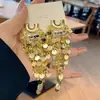 Brincos de Franja Longa com Lantejoulas em Cacho em Forma de U de Agulha de Prata Brincos Pendentes Pesados Europeus e Americanos de Metal para Mulheres