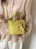 Bolso tipo cubo súper popular para mujer 2026 nueva moda bolso cruzado versátil bolso de mano pequeño de moda para verano