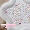 Acessórios Mini Laço para Nail Art 2026 Novo Estilo Francês Gravata Borboleta Tamanhos Mistos Cor Rosa Claro Pedrarias para Unhas Pequenos Acessórios