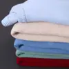 Venta al por mayor del fabricante Suéter de punto con cuello redondo para hombre Ajuste slim Camiseta base de punto Estilo coreano para primavera y otoño Suéter casual para hombre Tendencia