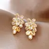 Pendientes Exquisitos y de Lujo de Flor de Zirconia Dorada para Mujer, Nuevo Estilo de Alta Venta 2026, Pendientes de Gama Alta, Pendientes Únicos y Hermosos
