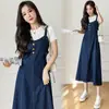 Foto Real da Nova Saia Salopete Jeans Elegante Retro de Cintura Alta para Primavera e Outono 2025 com Efeito Emagrecedor que Molda o Corpo