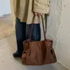 Bolso tote minimalista de estilo coreano con un aire relajado, color liso, nueva colección otoño 2026, gran capacidad, adecuado para el trabajo y los desplazamientos, bolso de hombro o bolso de axila