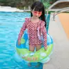 En stock Anillo inflable engrosado para natación infantil Anillo de natación de dinosaurio Anillo de natación de verano colorido Anillo para las axilas Anillo de natación con asa estéreo