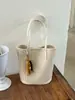 Bolsa feminina de palha trançada vintage, nova bolsa tote coreana outono e inverno 2025, bolsa de ombro simples de grande capacidade para o dia a dia