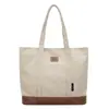 Bolsa de lona de poliéster y algodón de gran capacidad, simple y resistente, nuevo diseño de moda 2026, bolso de hombro texturizado con letras en relieve
