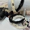 Faixa de cabelo nova de renda organza estilo Xiaoxiang primavera e verão laço de renda pérola strass temperamento faixa de cabeça feminina