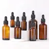 Frascos conta-gotas de plástico com anel de segurança do fabricante em estoque 5ml 10ml 20ml 30ml 50ml frascos de vidro marrom para óleos essenciais