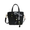 Bolso tejido para mujer, nueva moda transfronteriza, bolso cruzado versátil de alta gama, bolso de hombro de nicho de lujo ligero con bufanda de seda