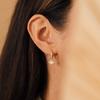 Europa y Estados Unidos nuevo estilo de lujo aretes ojo de diablo moda personalizada aretes de cobre con diamantes joyería para mujer al por mayor