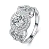 Anel de conjunto de luxo europeu e americano com microincrustação de diamantes completos para casais, anel de conjunto de casamento e noivado, anel de noivado com zircônia de temperamento fashion r5483
