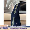 Calça de moletom cinza de peso pesado com listras e barra curva para homens, calça esportiva drapeada moderna de verão estilo americano, calça casual solta de perna larga