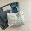 Bolso de Graffiti de Moda para Viajar 2025 Nuevo Modelo Bolso de Mujer Casual Dulce Bolso de Mano Bolso de Hombro Bolso Tote de Moda para Mujer