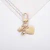 Llavero con Forma de Corazón de Concha de Perla, Lujo Ligero Hecho a Mano DIY Colgante Exquisito para Bolso Adorno Colgante Creativo