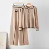 Conjunto de punto para mujer estilo europeo transfronterizo, nuevo conjunto casual de otoño de suéter con cuello polo y pantalones de pierna ancha