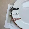 Accesorios creativos de llave inglesa transfronterizos europeos y americanos, clips para el pelo laterales sin costuras de pegamento de crema DIY para niñas, pinzas de pelo de pico de pato, llaveros