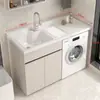 Gabinete de lavandería para balcón de aluminio tipo panal con lavadora integrada, incluyendo una tabla de lavar y un fregadero de piedra de cuarzo artificial con una barrera de agua