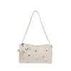 Bolso tipo almohada de diseño exclusivo estilo coreano 2026 Nuevo Bolso de hombro casual versátil con decoración de estrella Bolso cruzado simple para mujer