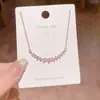 Collar de corazón de moda estilo coreano para mujer, microincrustado con diamantes, cadena simple y versátil de acero de titanio en forma de corazón para la clavícula al por mayor