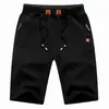 Shorts masculinos transfronteiriços cor sólida combinando calça esportiva de manga curta combinando terno utilitário calças casuais transfronteiriças comércio exterior masculino