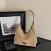 Bolso tote grande de estilo coreano minimalista nuevo 2026, moderno y elegante, adecuado para uso casual y para ir al trabajo, se puede llevar como bolso de hombro o bolso cruzado.