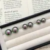 Pendientes de botón de plata S999 con perla verde aurora para mujer 2026 Nuevo estilo popular Verde pavo real Alto nivel Lujo ligero Sensación noble