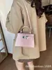 Bolso de mujer transfronterizo, nuevo modelo 2026, bolso de mano retro simple y elegante con estampado de cocodrilo, bolso de hombro, bolso cruzado, bolso Kelly