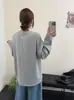 Camiseta de Manga Larga Minimalista Versátil de Estilo Nuevo para Mujer de Principios de Primavera Coreana con Pequeña Etiqueta de Cuero en la Espalda y Costura Central, Corte Holgado y Efecto Adelgazante